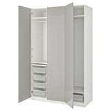 White PAX wardrobe with mesh baskets, shelves, and drawers in a clean, modern design.