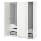 White PAX wardrobe with open doors, showing shelves, drawers, and mesh baskets.