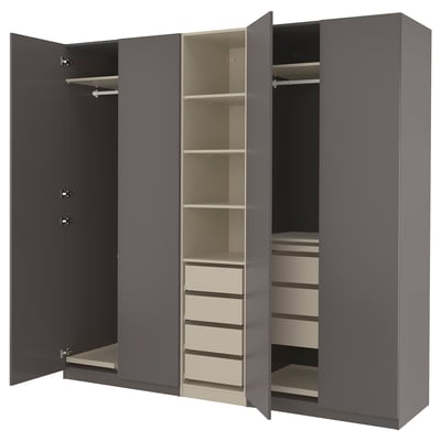 Gray PAX wardrobe, open showing shelves and drawers.