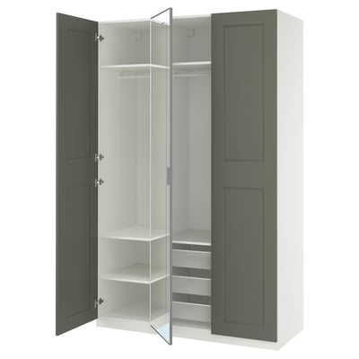 Green ikea PAX wardrobe with mirrored doors, open to show shelves and drawers.