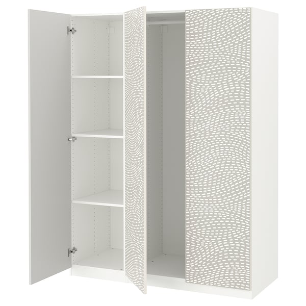 White PAX wardrobe, open doors revealing shelves, wavy textured pattern on one door.
