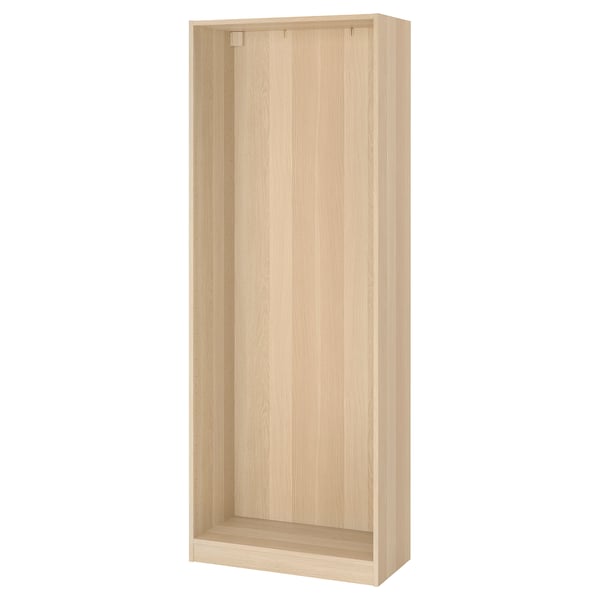Ikea PAX wooden wardrobe frame, light beige, rectangular, sturdy design.