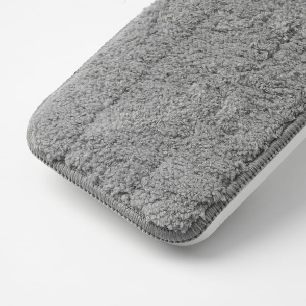 Close-up of a thick, textured microfiber pad, ideal for cleaning, attached to a flat mop head.