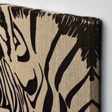 Canvas wall art with black abstract pattern on beige background, wrapped around frame. Detailed, high-quality print.