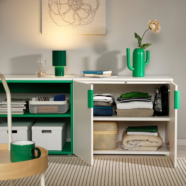 Modern storage unit with open & closed compartments, neatly organising clothing, books, and decor. Adjustable feet for uneven floors.