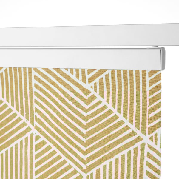 Geometric-patterned rolling curtain. Privacy and light reduction, ideal for windows. Aluminum rail system.