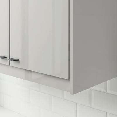 Modern grey gloss cabinet edges, hiding lighting and cords under kitchen cabinets.