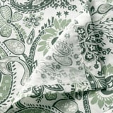 Paisley-patterned bedsheet, crisp, fresh green tones, soft fabric blend, showing fine weave and hem details.