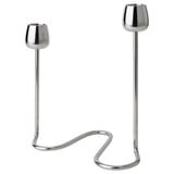The SILVERPÄRON set includes two stainless steel candlesticks with curved, stem-like bases and rounded cups, reflecting natural flower designs.