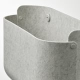 White basket with silver fasteners