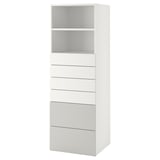 A white SMÅSTAD storage unit with an open shelf at the top and five drawers below, ideal for organizing various items.