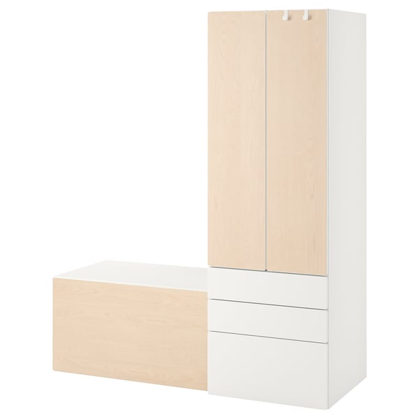 The SMÅSTAD wardrobe, in white and light wood, hanging space, drawers, and a bench for versatile storage.