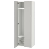 A white ikea SMÅSTAD wardrobe with one door open, revealing storage shelves.