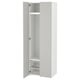 A white ikea SMÅSTAD wardrobe with one door open, revealing storage shelves.