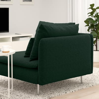 Green SÖDERHAMN sofa with deep seats, loose cushions, and metal legs in modern living room.