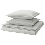 Stack of grey striped pillows & duvet cover, folded in grey and white stripes, SOLFIBBLA set by ikea.