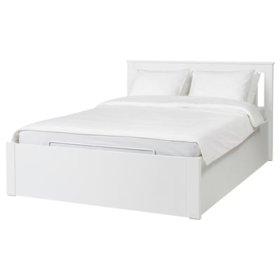 White modern minimalist bed with built-in storage, sleek design, clean lines.