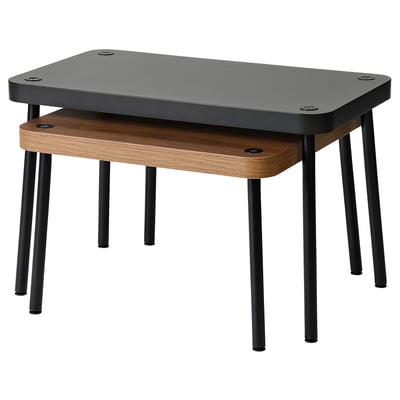 Two modern nesting tables: one square, one rectangular, black metal legs, wood tops.