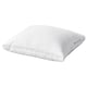 A white STRANDMOLKE pillow with a supportive core and soft outer filling, featuring double piping and a dobby-weave cotton cover.