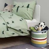 Green multi-striped cotton toy basket with panda and cat-themed bedding.