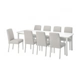 STRANDTORP white dining set includes rectangular table, 7 light grey fabric chairs, sleek design, sturdy wooden and metal construction.