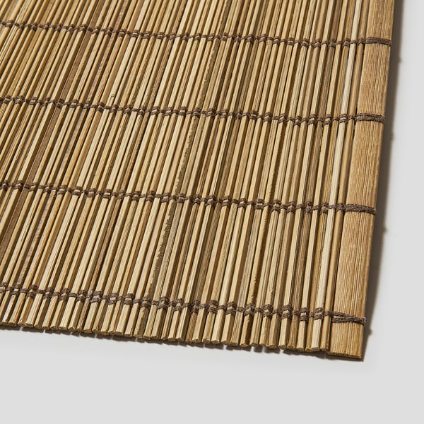 Handwoven bamboo placemat, natural & stylish, crafted by skilled artisans, gentle on tableware.