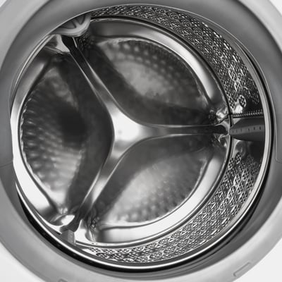 Washing machine drum with water flow showing. Designed for efficient, adjustable washing with steam program and various settings.