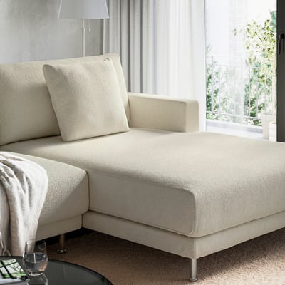 Modern cream sectional sofa with chaise, perfect for living room relaxation.
