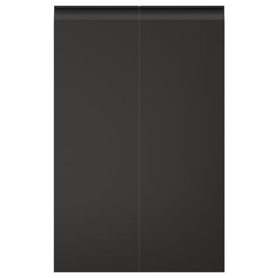 Black UPPLÖV cabinet doors with sleek, integrated handles and chamfered edges.