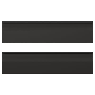 Two black rectangular kitchen cabinet fronts with sleek, simple lines and integrated handles. Modern, minimalist design.