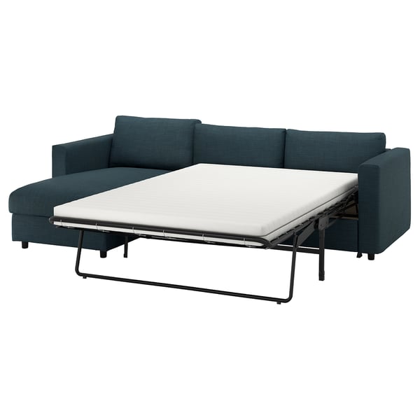 Teal VIMLE sofa-bed, dark metal legs, cozy fabric.