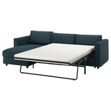 Teal VIMLE sofa-bed, dark metal legs, cozy fabric.