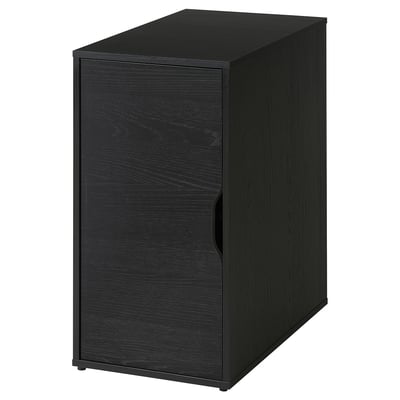 Um armário preto ALEX da ikea com um design elegante, com acabamento em todos os lados.