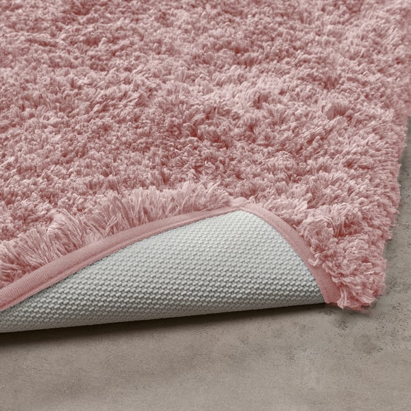 Tapete de banho cor-de-rosa fofo com suporte antiderrapante.