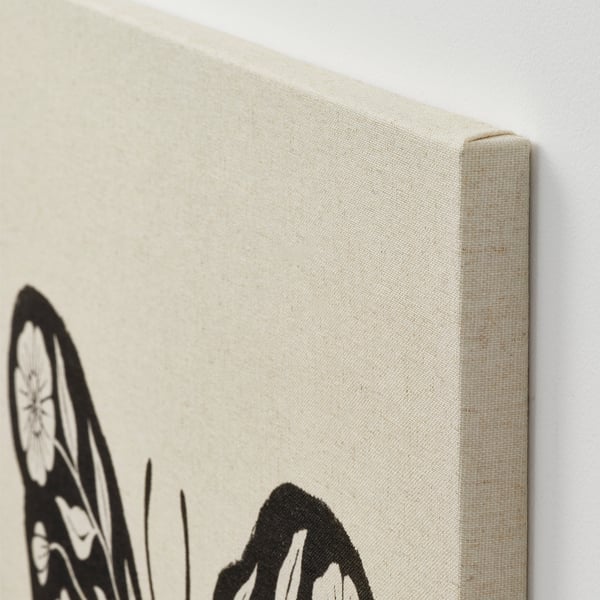 Close-up de arte em tela feita à mão com textura visível, mostrando profundidade e qualidade.