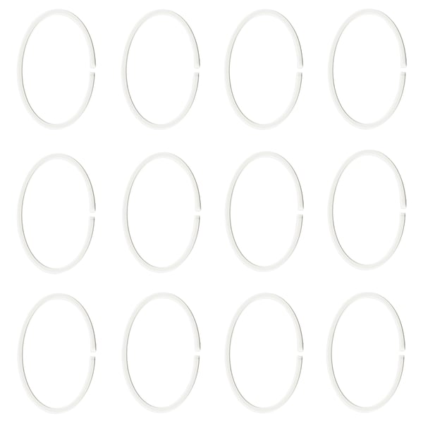 Doze aros de plástico ovais brancos exibidos em filas.