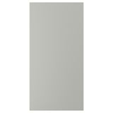 Exibe uma porta de armário de cozinha retangular cinza claro HAVSTORP, de design liso e simples.