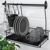 O rack de cozinha preto comporta pratos, utensílios e possui bandeja removível para secagem.