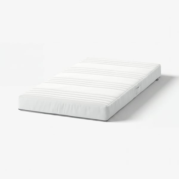Colchão branco de bebé com superfície texturizada e fecho.