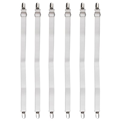 Seis tiras de lençol elástico branco com clipes de metal, garantindo que os lençóis ajustados permaneçam no lugar.