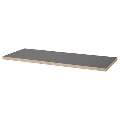 Um tampo de mesa ikea LAGKAPTEN. É cinza, retangular e feito de fibra com tinta acrílica.