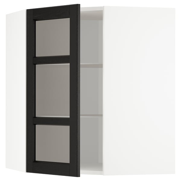 Um armário de madeira manchada de preto com portas de vidro e prateleiras ajustáveis.