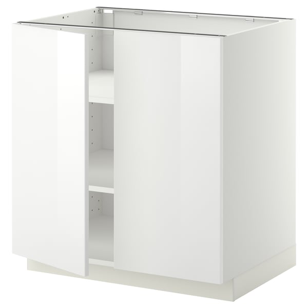 Um armário de cozinha ikea METOD branco. É retangular, tem um acabamento brilhante e uma prateleira aberta.