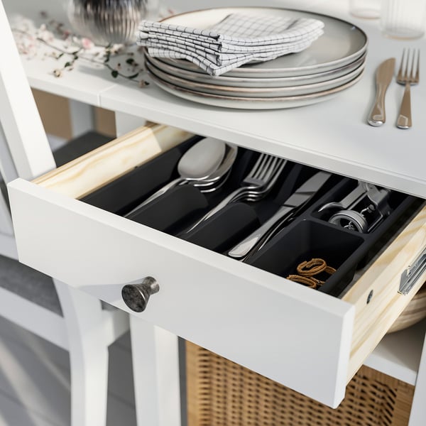 Gaveta em conjunto de jantar branco NÄSINGE com organizador de talheres.