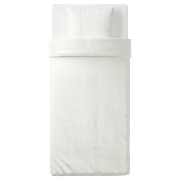 OFELIA VASS: conjunto de edredom de algodão branco, textura enrugada, fronha envelope, fecho de plástico.