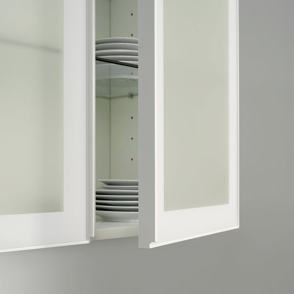 Película para vidros PUCKELFLY, parcialmente instalada, branca, retangular, luz privada.