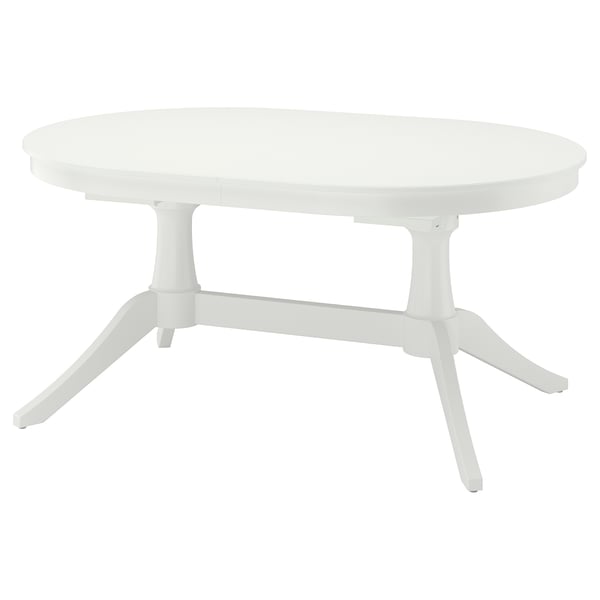 Mesa de jantar oval extensível branca com pernas robustas, combinando funcionalidade e elegância.