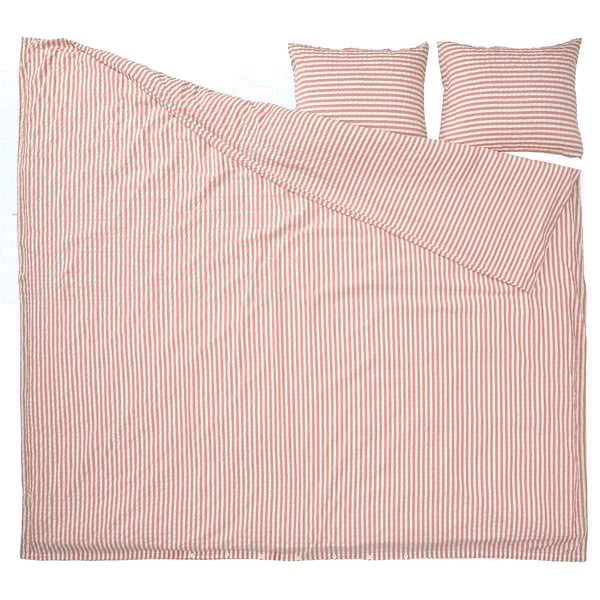 Conjunto de roupa de cama às riscas vermelhas e brancas vibrantes com textura seersucker, com edredão e almofadas, feitas de algodão respirável e viscose.