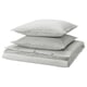 Conjunto de almofadas e capa de edredom listradas cinza, dobradas em listras cinza e brancas, conjunto SOLFIBBLA da ikea.