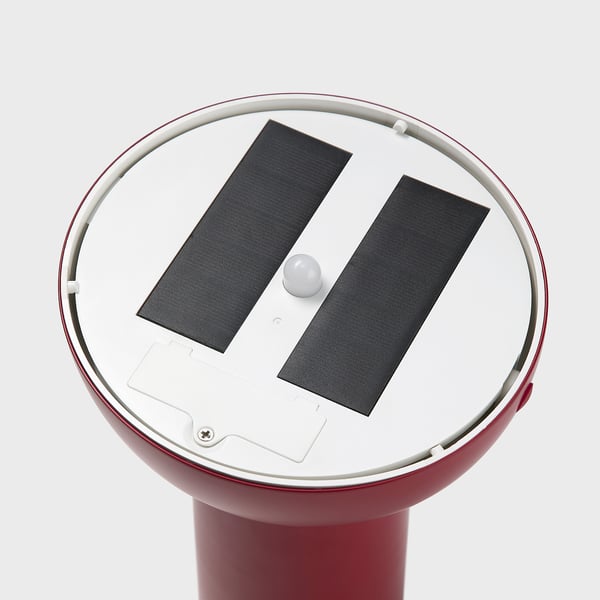Luz externa vermelha com painéis solares e uma base redonda. Design moderno, materiais de qualidade.